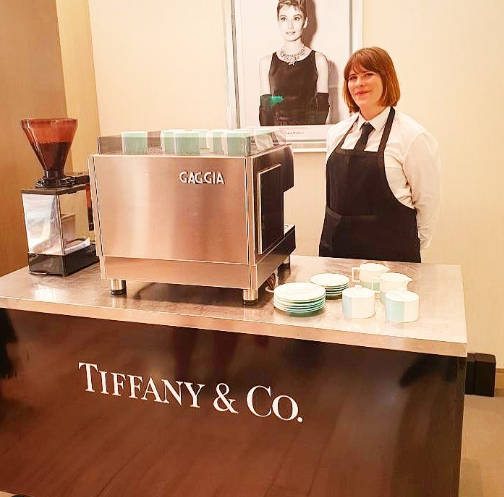 Liquid Infusion barista serving Tiffany & Co. branded mobile coffee cart at a luxury brand event